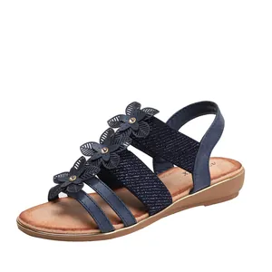 Sandales bohèmes à talons compensés bleu marine avec fleurs en strass et brides extensibles