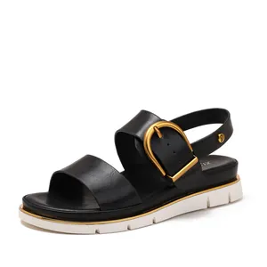 Sandales à plateforme noires pour femmes avec boucle dorée et semelle compensée blanche