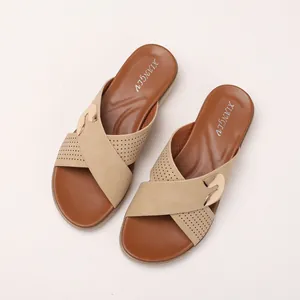 Beige bohemian wedge flip flops with metallic buckle and perforated straps