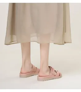 Detail of pink summer platform sandal with cross straps and non-slip thick sole