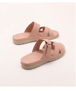 Detail view of pink wedge sandals showing soft footbed and adjustable velcro straps