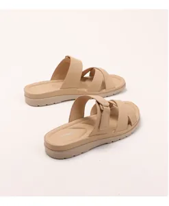 Detailed side view of apricot platform wedge sandals with adjustable strap and thick sole