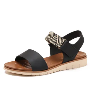 Women's wedge sandals with black woven straps and orthopedic massage soles for summer comfort