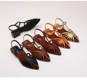 Collection of women's woven slingback flat sandals in five different metallic colors