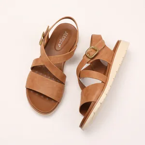 Brown platform wedge sandals with cross-strap design and vintage metal buckle for women