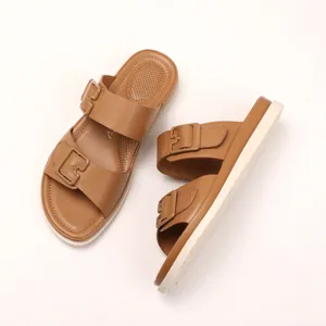 Brown dual-strap platform sandals with adjustable buckles and thick non-slip soles