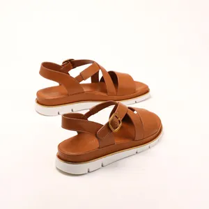Women's brown leather platform wedge sandals with white serrated sole for summer