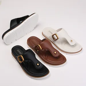 Set of thong sandals in black, brown and white with vintage metal buckles and soft soles
