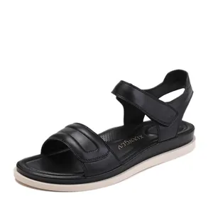 Women's black soft-sole sandals with adjustable velcro straps for comfortable beach walking