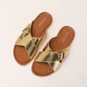 Women's gold cross-strap platform beach sandals with stylish buckle and flat sole