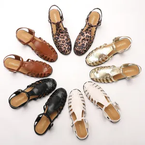 Detail of woven cutout fisherman sandals in gold, leopard, white, black and brown colors