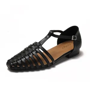 Women's French retro black leather woven Roman sandals with flat sole and T-strap buckle