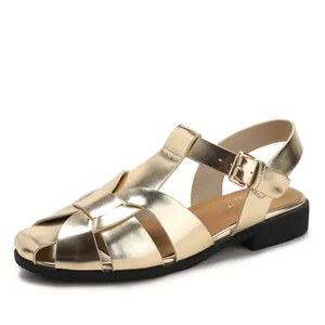 Sandali alla pescatora color oro champagne con tomaia intrecciata e cinturino