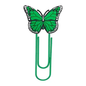 Macro shot of 3D green butterfly paperclip with vivid PVC detail and coated metal finish