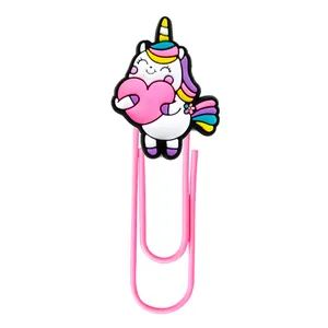 Detailed view of pink metal paperclip with a 3D unicorn cartoon PVC bookmark detail
