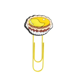 Detail of creative PVC paperclip featuring a cute cartoon egg tart dessert bookmark design