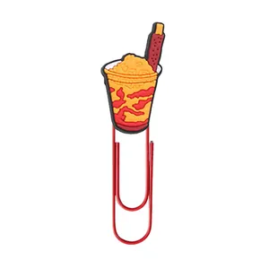 Detail of creative smoothie cup paperclip made of orange soft rubber and red metal
