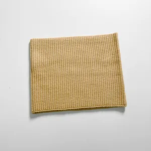 Detailed close-up of camel ribbed knit texture on a warm winter neck gaiter