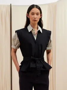 Gilet noir minimaliste à col en V avec ceinture pour femme, look chic d'automne précoce