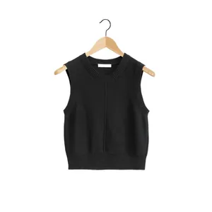 Minimalist black wool knitted vest with crew neck and central seam detail on white background