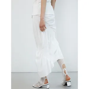White high waist irregular fishtail skirt with elegant smocking texture details