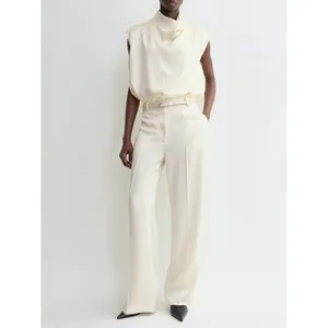 Elegant minimalist satin sleeveless turtleneck top with matching wide-leg pants