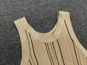 Detail shot of khaki ribbed knit vest with black vertical stripes and crew neckline