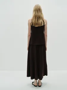 Minimalist dark brown cotton tank top and skirt set showing silhouette from the back