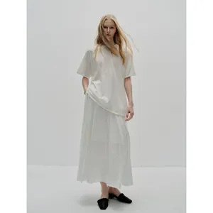 Minimalist white short sleeve top and pleated maxi skirt set for women's summer fashion