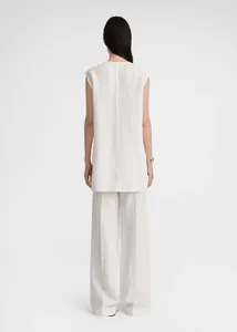 Rear view detail of white minimalist cotton-linen sleeveless top with center back seam
