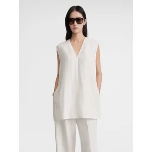 Minimalist white V-neck sleeveless top with side slits and loose fit for summer