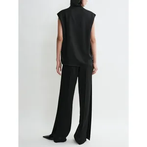 Minimalist black sleeveless top and wide-leg pants set, elegant back view for women