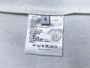 Detail view of the wash label showing 55% Tencel and 45% cotton fabric composition