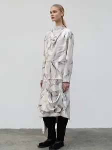 Detail of grey wave print long sleeve top and asymmetric skirt set with silk texture
