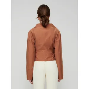 Back view of a rust brown long sleeve knotted shirt with a minimalist cropped design
