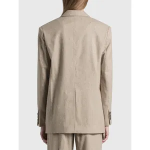 Back view of a minimalist oat beige oversized blazer for women with classic tailoring