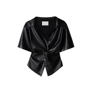 Chic black faux leather V-neck short sleeve shirt with twist knot and asymmetrical hem