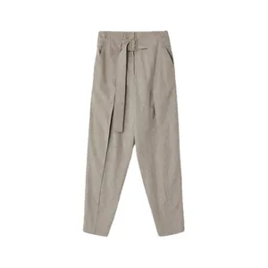 Women high waist tapered trousers in oatmeal with matching belt and pleats