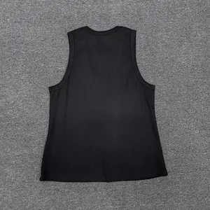 Flat lay macro view showing the soft cotton knit texture of a black sleeveless vest top