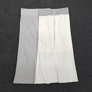 Detailed flat lay of long midi skirts with drawstring elastic waistbands in gray and beige