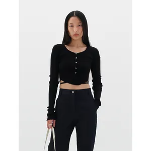 Women's black long sleeve ribbed knit cardigan with slim fit cropped hem and tie-waist detail