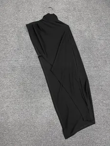 Detail of black turtleneck sleeveless top made from premium elastic knit fabric