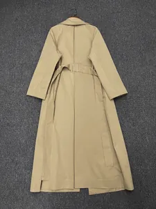 Detailed back view of khaki long trench coat featuring adjustable waist belt and hem slit