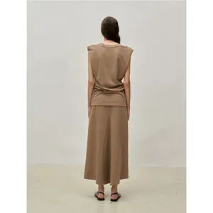 Women's minimalist two-piece set featuring a back-view sleeveless top and midi skirt