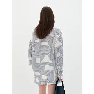 Women's minimalist two-piece set with geometric print loose shirt and matching shorts