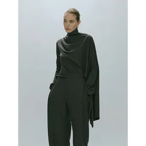 Dark grey two-piece set featuring high neck flared sleeve top and wide leg trousers