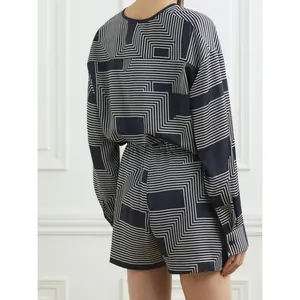Women's 2-piece deep blue set with white geometric patterns and loose-fit long sleeves