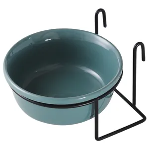 Hanging ceramic pet bowl with black metal wire rack for cat food and water storage