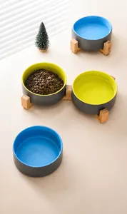 Ceramic elevated pet bowls with dual colors and wooden stand for food and water