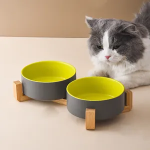 Elevated double ceramic cat bowls with wooden stand for neck protection and anti-slip